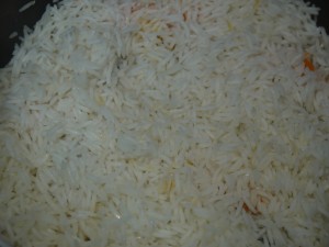 Add the remainder of the rice, cover with foil and place in the oven at 180 degrees for about 10 mins or cook on very low on stove top till cooked