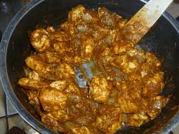 add oil, remaining onions, tomato paste, safron, green chillies and yoghurt cook for 5 mins then add marinated chicken. cook stiring occasionally for 20 mins then add potatoes, add also salt, spices or yoghurt if need be.once cooked add garam masala and stir thru.